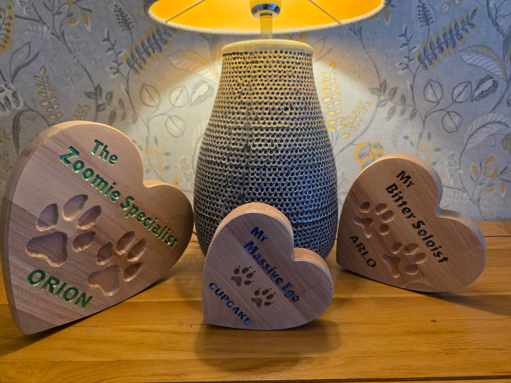 Your Dog’s Actual Paw Print, Deep-Carved in Solid Hardwood