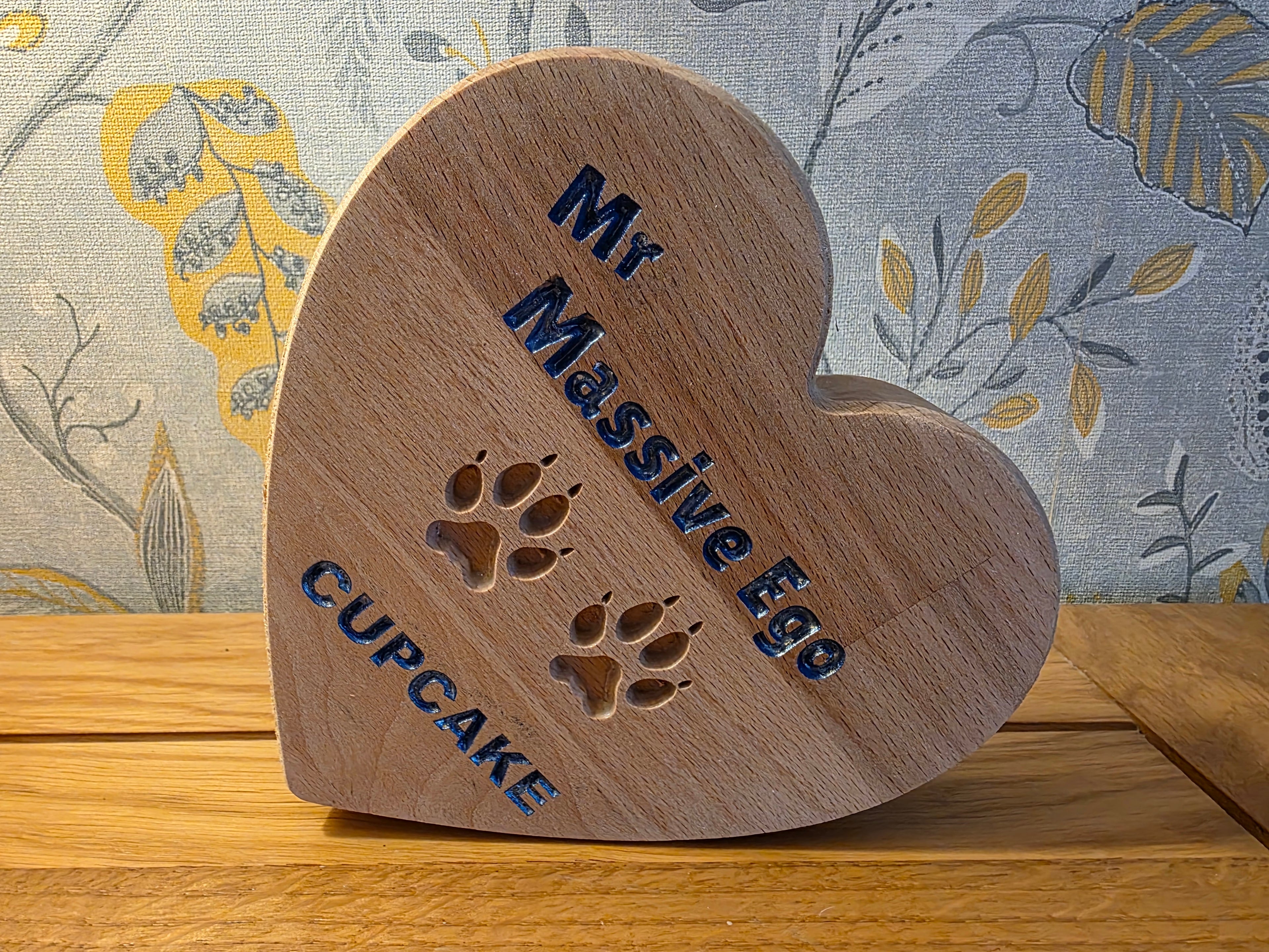 Your Dog’s Actual Paw Print, Deep-Carved in Solid Hardwood