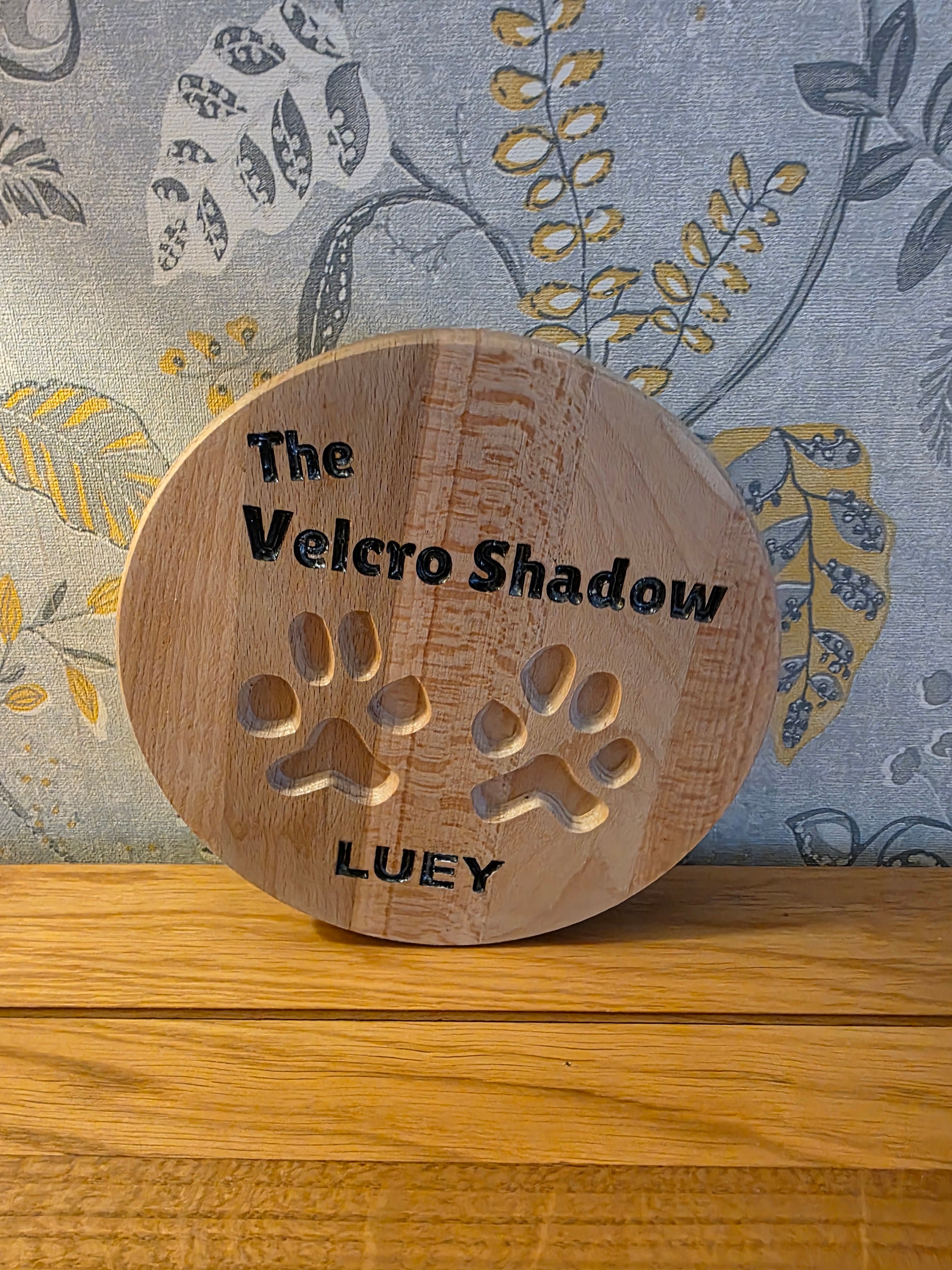 Your Dog’s Actual Paw Print, Deep-Carved in Solid Hardwood