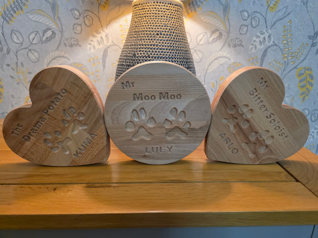 Your Dog’s Actual Paw Print, Deep-Carved in Solid Hardwood