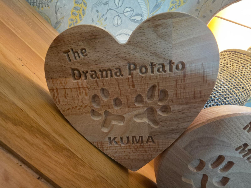 Your Dog’s Actual Paw Print, Deep-Carved in Solid Hardwood