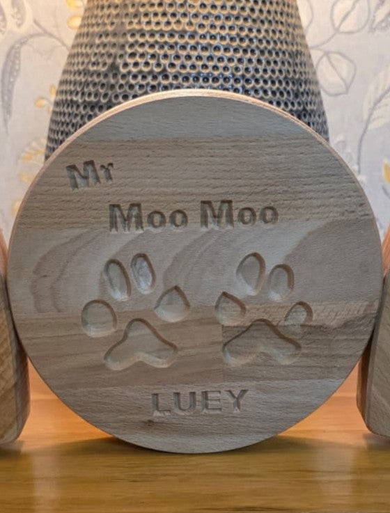 Your Dog’s Actual Paw Print, Deep-Carved in Solid Hardwood